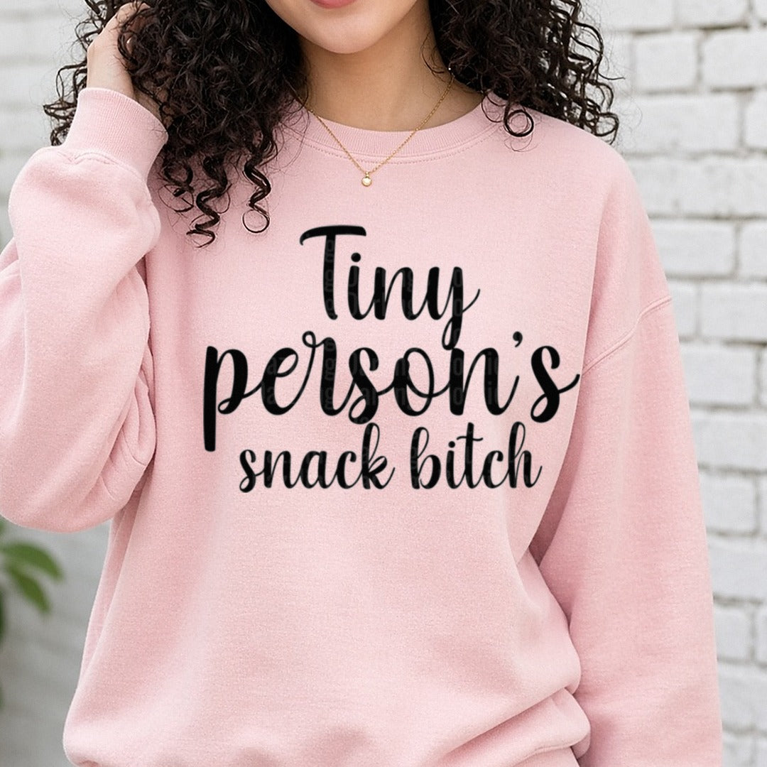 Tiny Person's Snack B*tch Funny Mom DTF transfer shown on a Comfort Colors sweatshirt