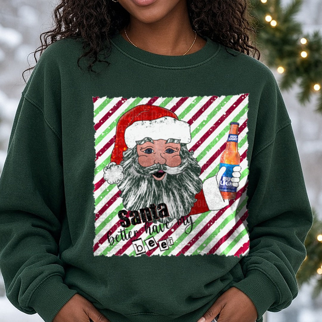 Santa Better Have My Beer Candy Cane Stripes Blue Bottle DTF transfer shown on a Comfort Colors sweatshirt