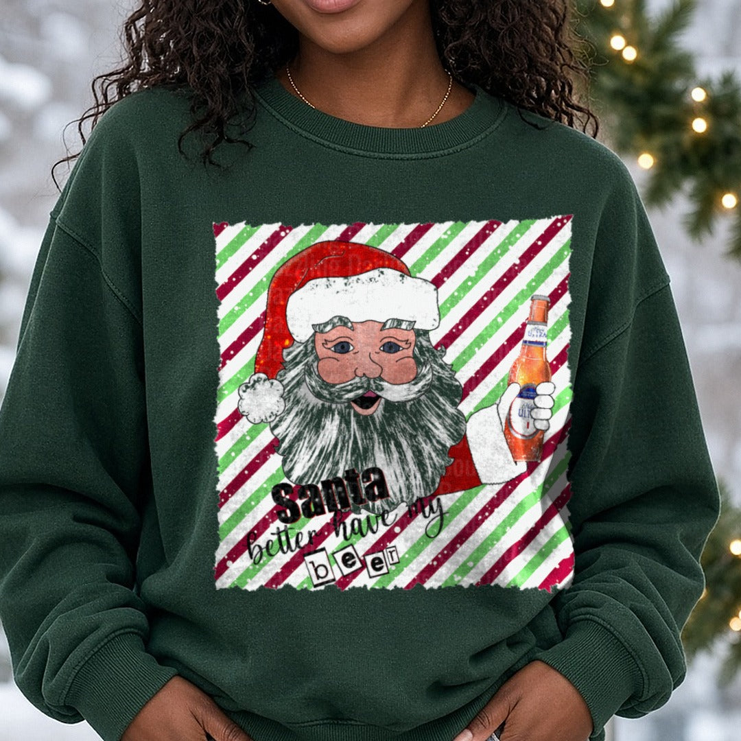 Santa Better Have My Beer Candy Cane Stripes Amber Blue Label DTF transfer shown on a Comfort Colors sweatshirt