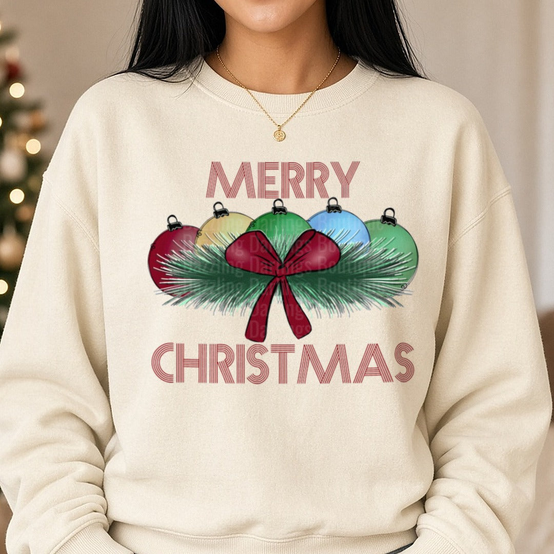 Merry Christmas Red Bow Pine Bulbs DTF transfer shown on a Comfort Colors sweatshirt