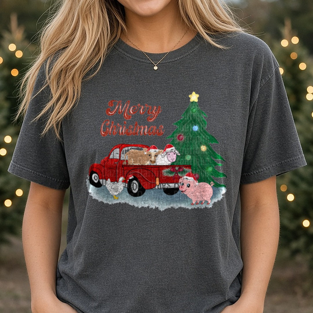 Merry Christmas Red Farm Truck Christmas Tree Animals DTF transfer shown on a Comfort Colors tee