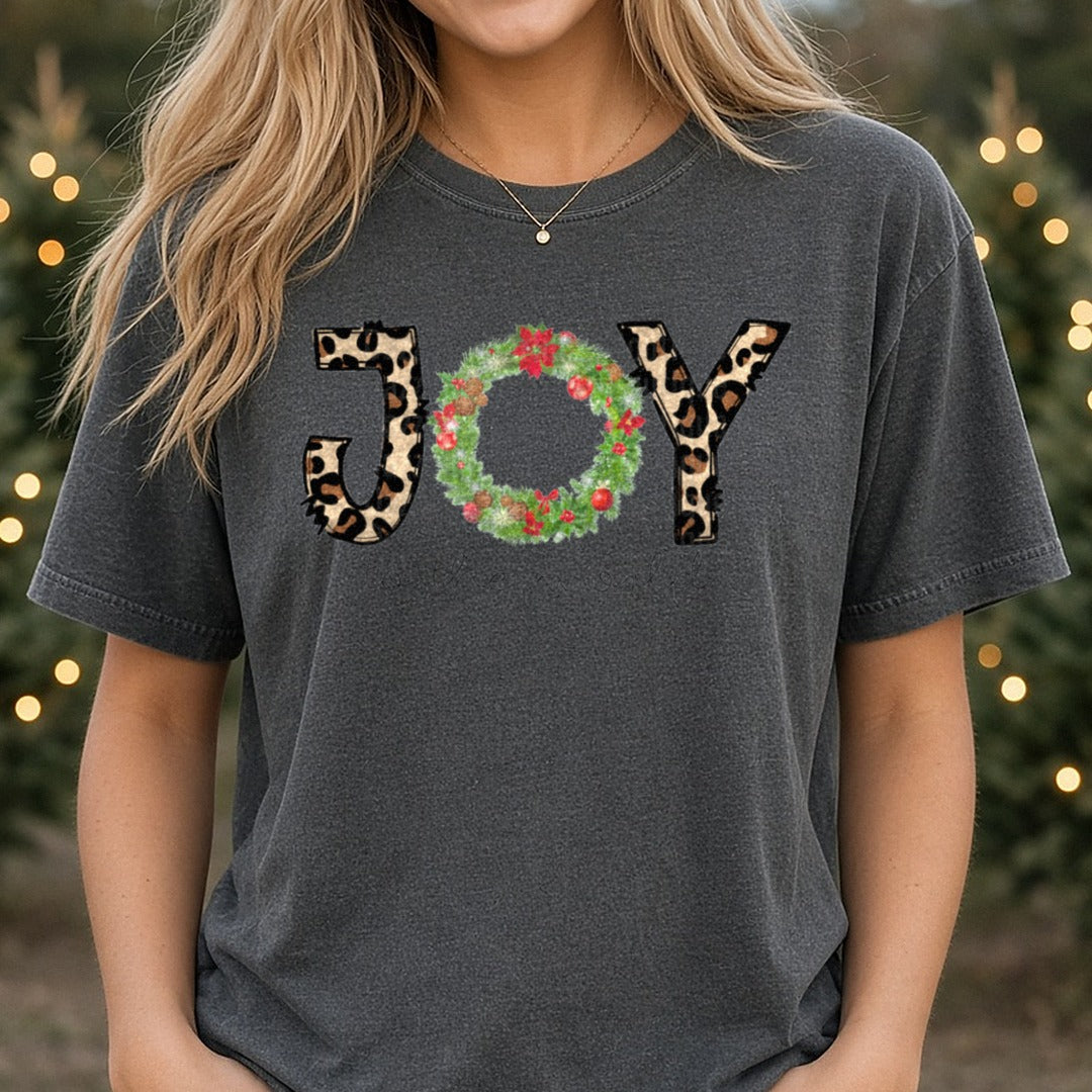 Joy To The World Leopard Wreath Christmas DTF transfer shown on a Comfort Colors tee