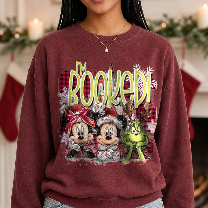 Booked grinch Mickey DTF transfer shown on a Comfort Colors sweatshirt