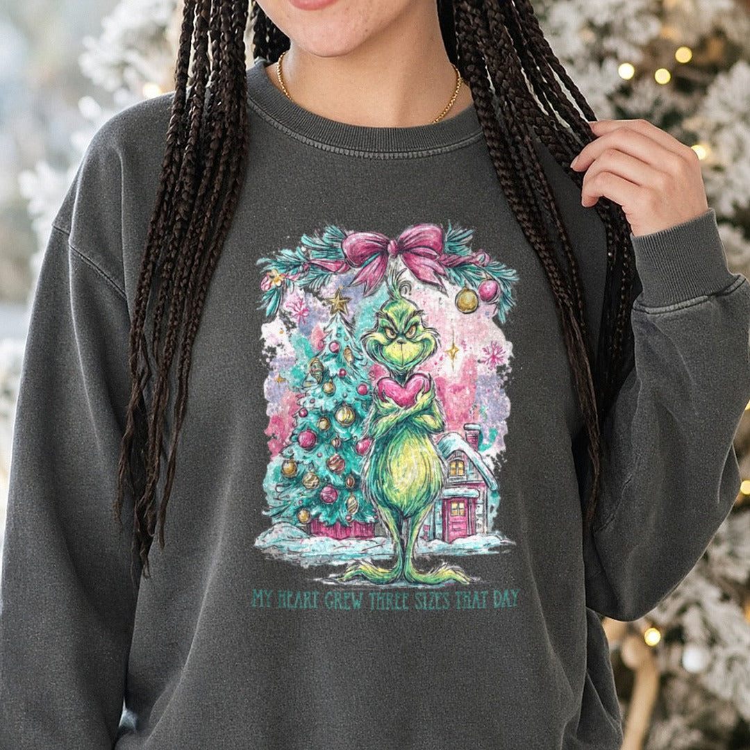 Grinch(2) - Copy DTF transfer shown on a Comfort Colors sweatshirt