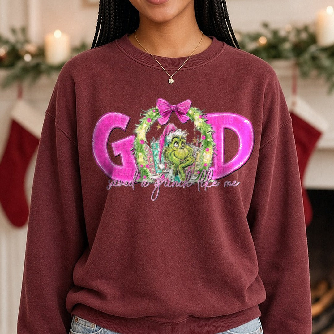 Grinch(1) - Copy DTF transfer shown on a Comfort Colors sweatshirt