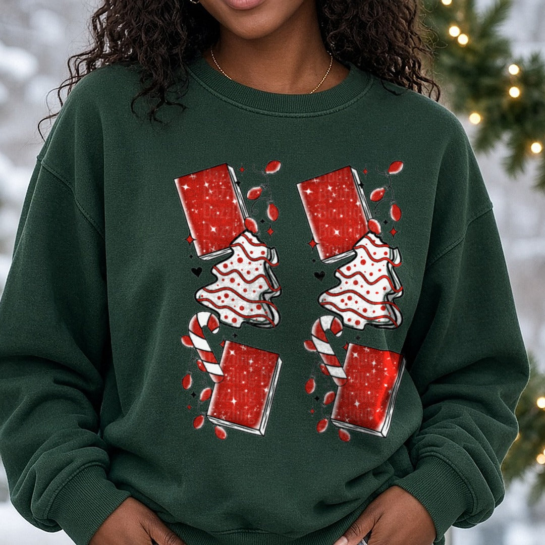 Christmas Ghistie with Book Sleeve DTF transfer shown on a Comfort Colors sweatshirt