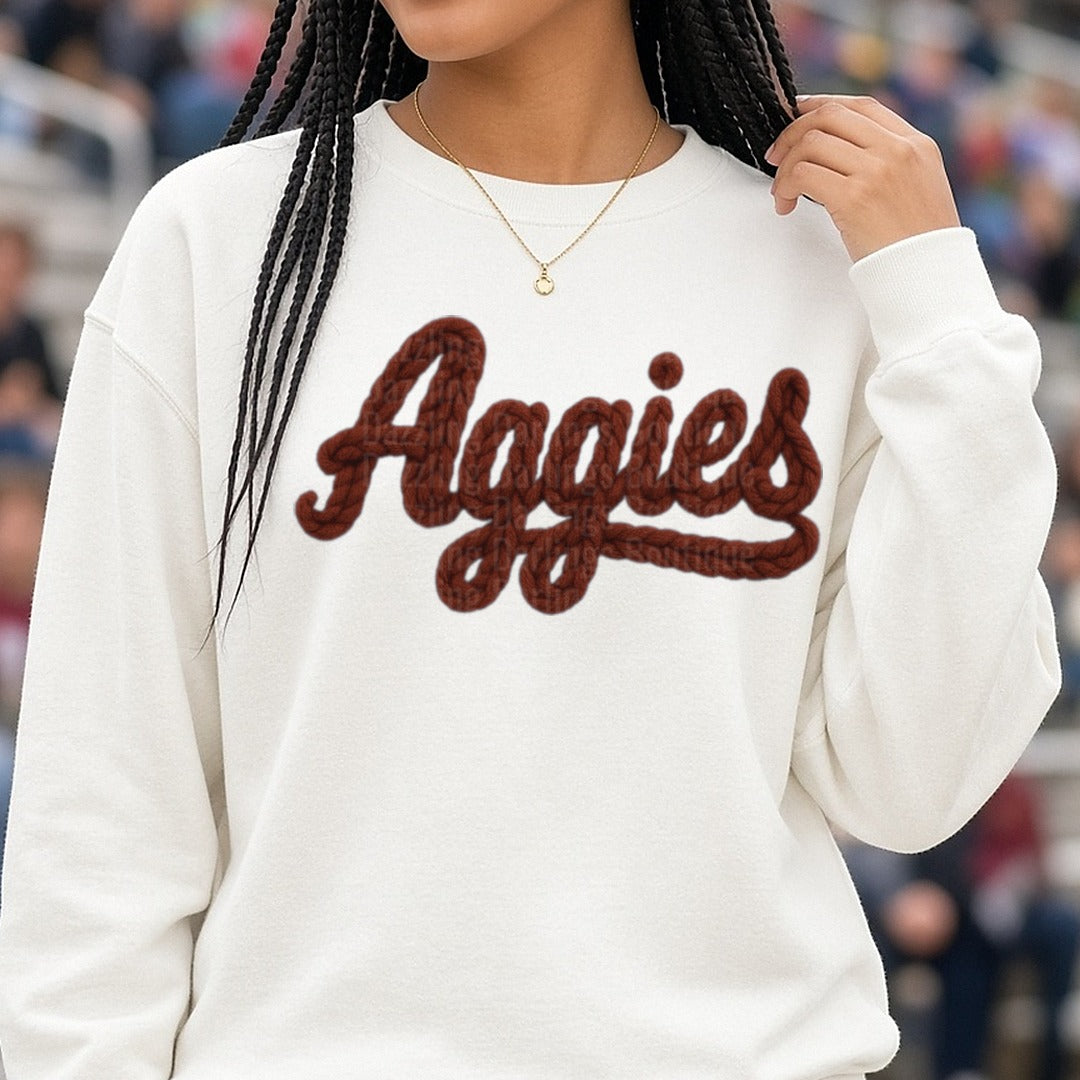 Aggies DTF transfer shown on a Comfort Colors sweatshirt