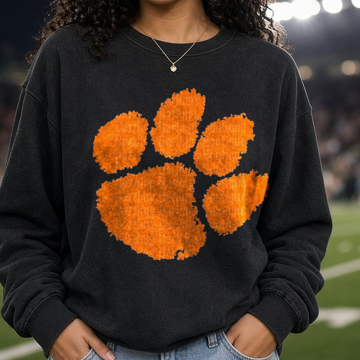 Tigers Orange Paw Print DTF transfer shown on a Comfort Colors sweatshirt