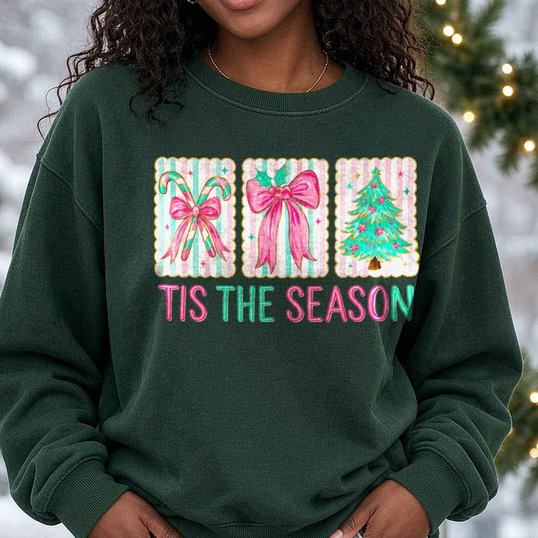 Tis The Season Pink Bows Candy Canes Christmas Tree DTF transfer shown on a Comfort Colors sweatshirt