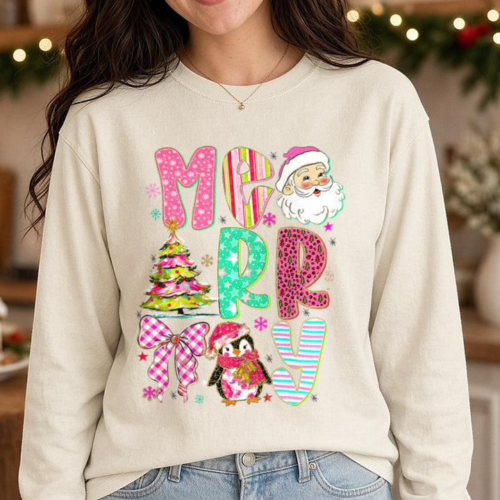 Merry Pink Santa Penguin Patterned Letters DTF transfer shown on a Comfort Colors long sleeve tee
