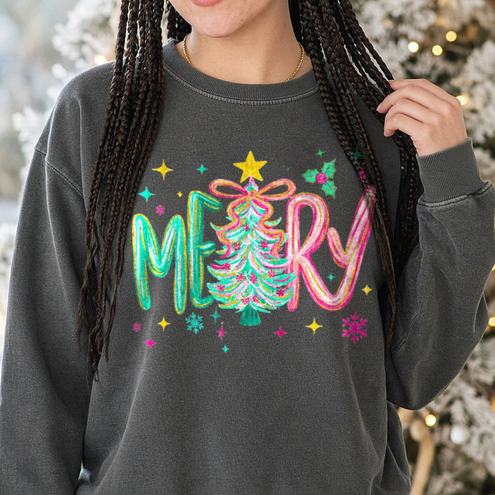 Merry Pastel Christmas Tree Glitter Letters DTF transfer shown on a Comfort Colors sweatshirt