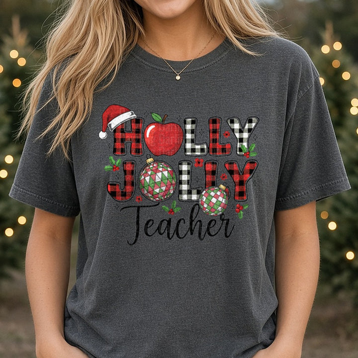 Holly Jolly Teacher Christmas Teacher DTF transfer shown on a Comfort Colors tee