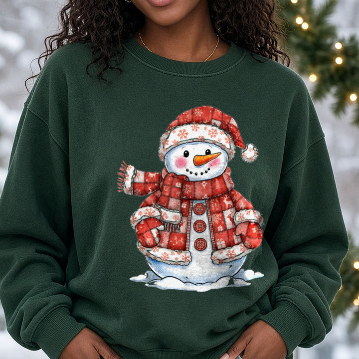 Patchwork Snowman Merry Christmas DTF transfer shown on a Comfort Colors sweatshirt