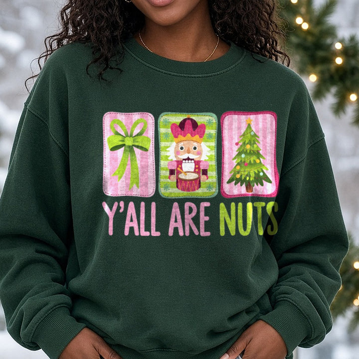 Coquette Christmas Nutcracker Y'all Are Nuts DTF transfer shown on a Comfort Colors sweatshirt