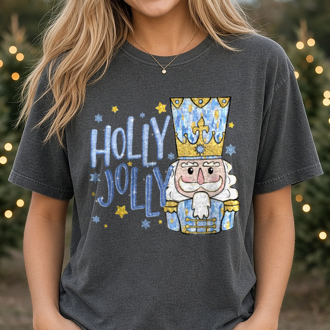 Holly Jolly Blue Nutcracker DTF transfer shown on a Comfort Colors tee