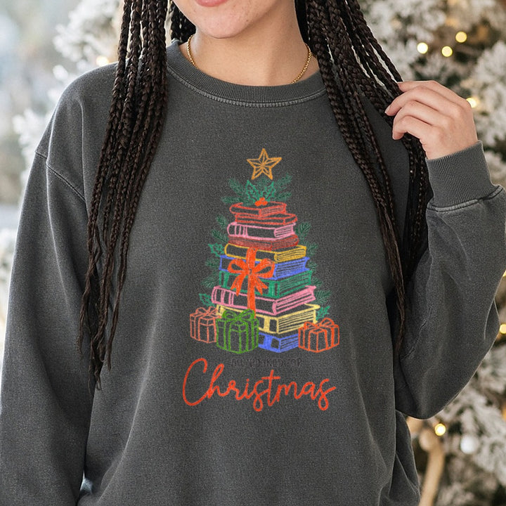 Christmas Book DTF transfer shown on a Comfort Colors sweatshirt