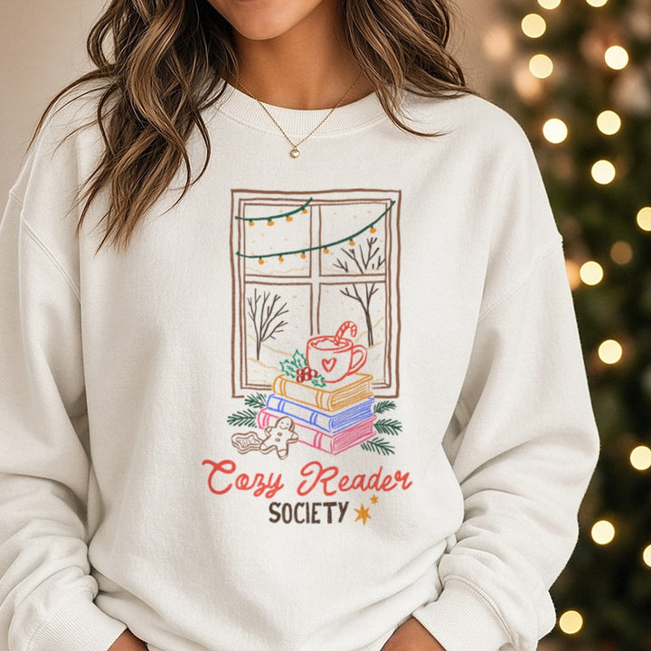 COZY READER SOCIETY Christmas Book DTF transfer shown on a Comfort Colors sweatshirt