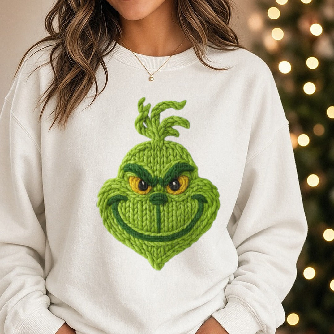 Yarn grinch DTF transfer shown on a Comfort Colors sweatshirt
