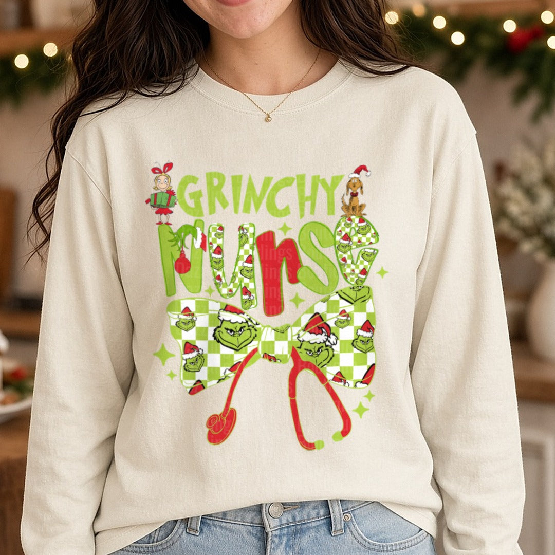grinchy nurse DTF transfer shown on a Comfort Colors long sleeve tee