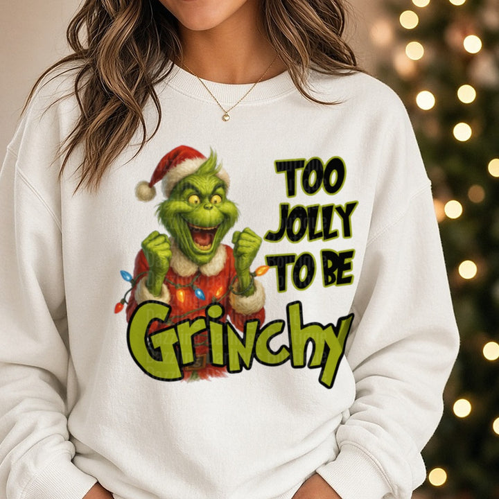 Jolly grinchy DTF transfer shown on a Comfort Colors sweatshirt