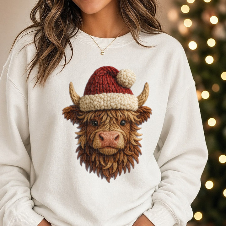 Cow Santa yarn DTF transfer shown on a Comfort Colors sweatshirt