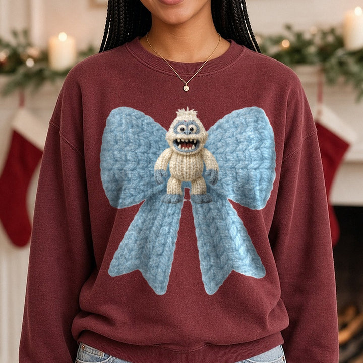abominable snowman bow DTF transfer shown on a Comfort Colors sweatshirt