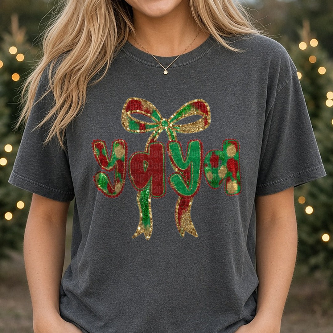 Yaya Christmas Glitter Bow Plaid Letters DTF transfer shown on a Comfort Colors tee