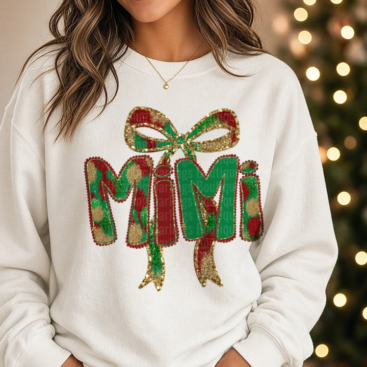 Mimi Christmas Glitter Bow Plaid Letters DTF transfer shown on a Comfort Colors sweatshirt