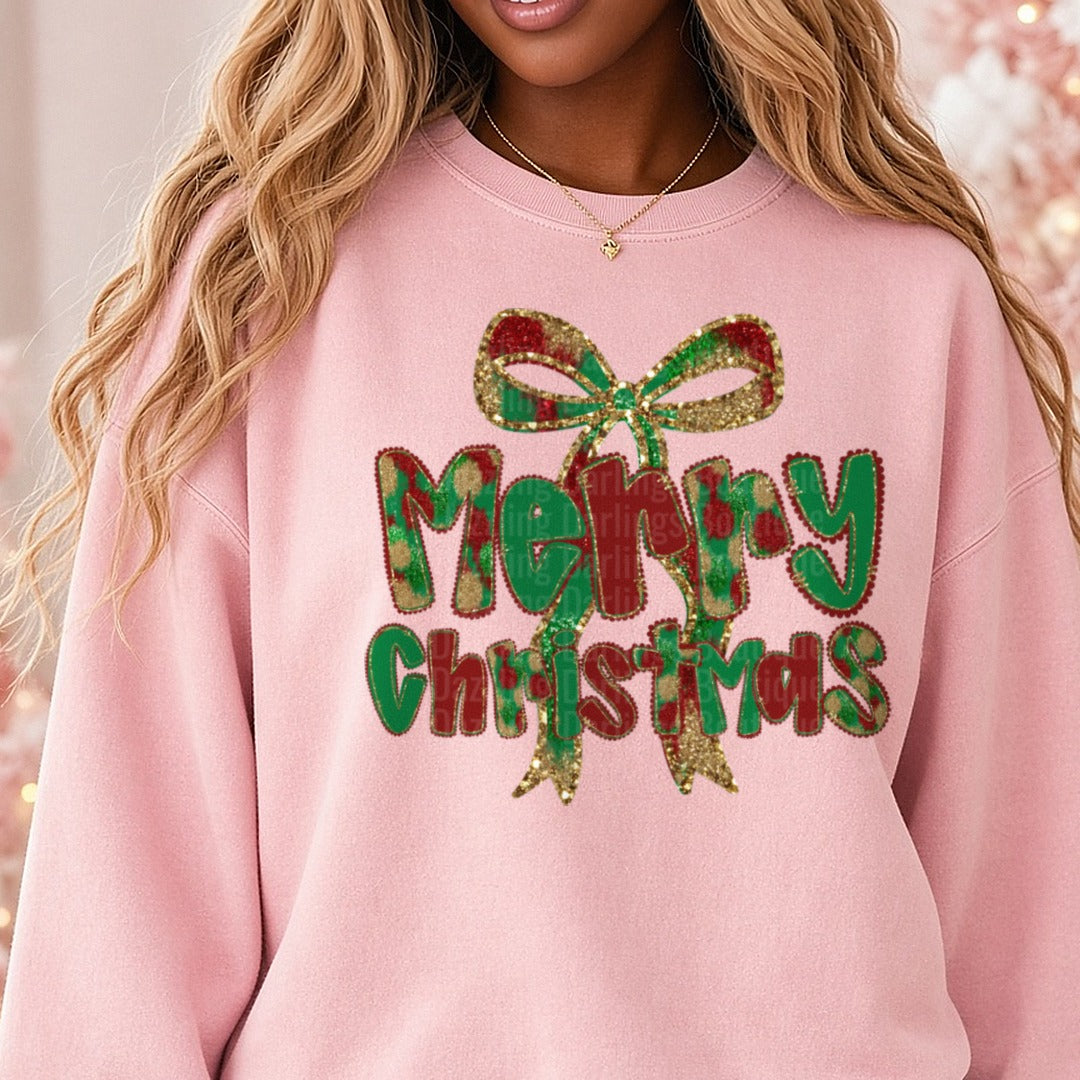 Merry Christmas Glitter Bow Plaid Letters DTF transfer shown on a Comfort Colors sweatshirt