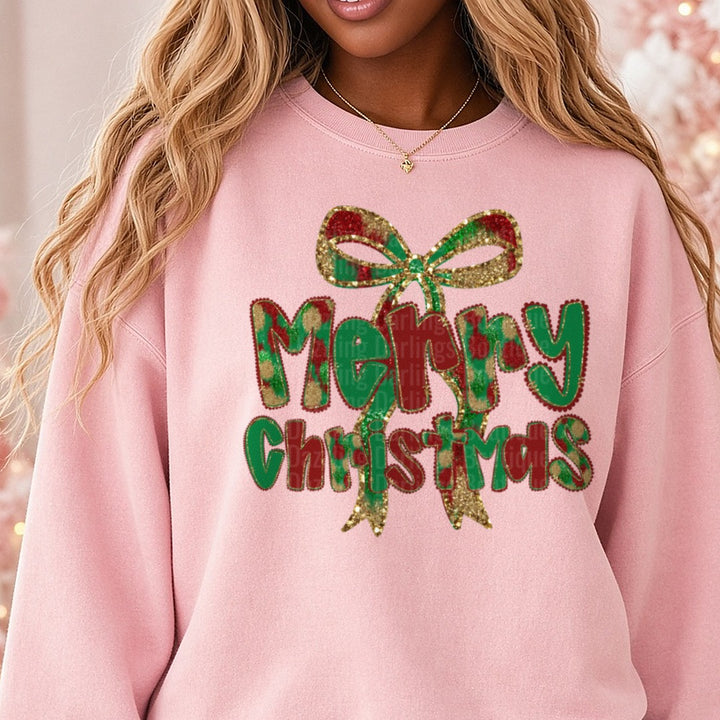 Merry Christmas Glitter Bow Plaid Letters DTF transfer shown on a Comfort Colors sweatshirt