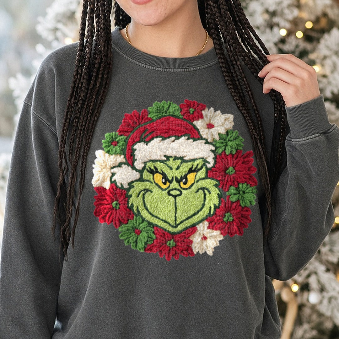 Grinch Wreath DTF transfer shown on a Comfort Colors sweatshirt