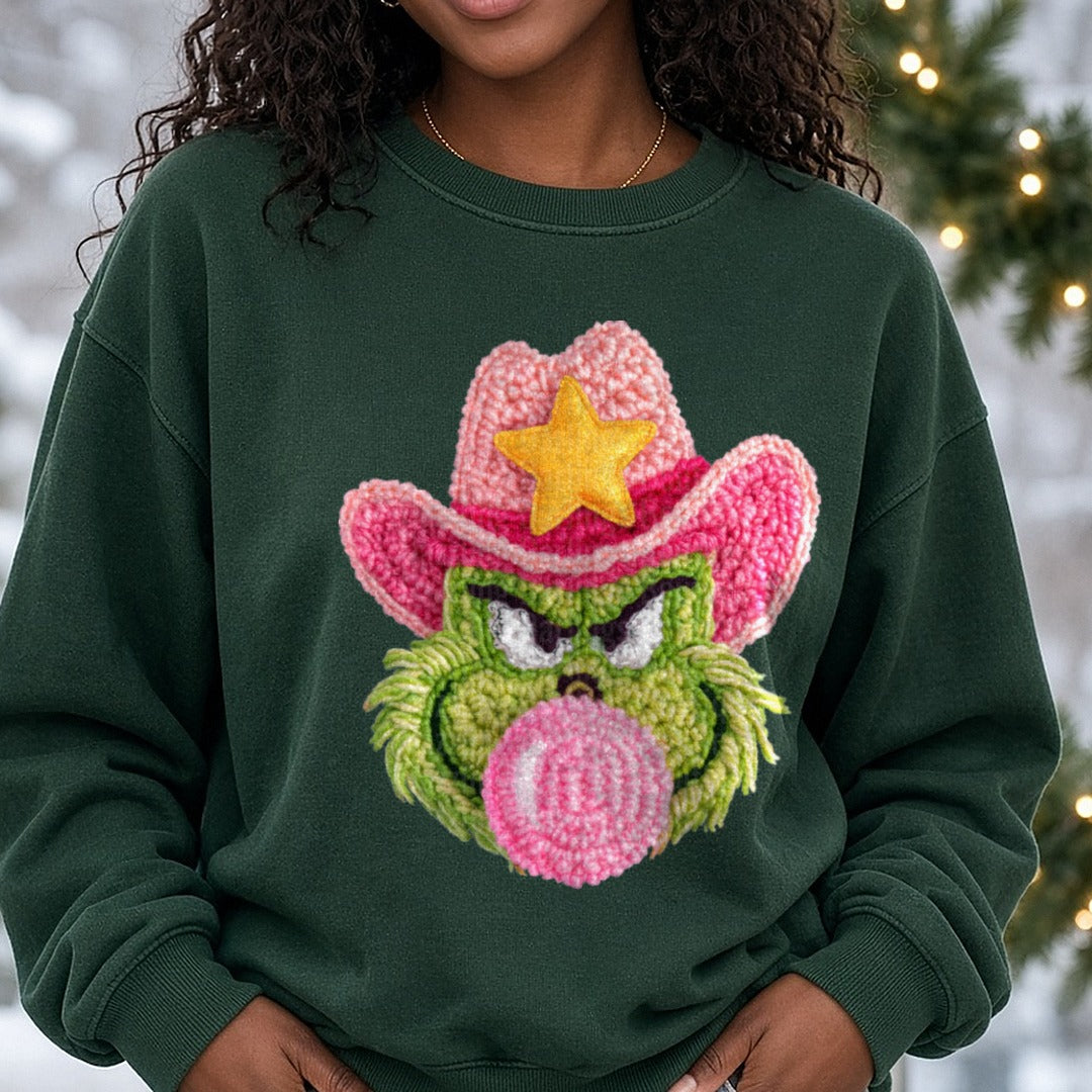 Cowboy Grinch DTF transfer shown on a Comfort Colors sweatshirt