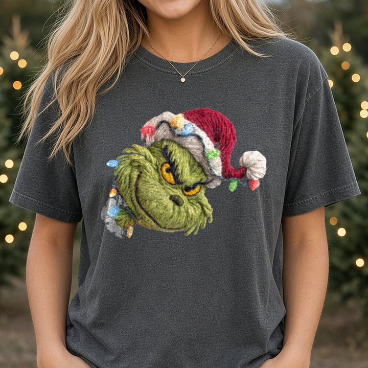 Grinch Christmas Lights Santa Hat Knit Style DTF transfer shown on a Comfort Colors tee