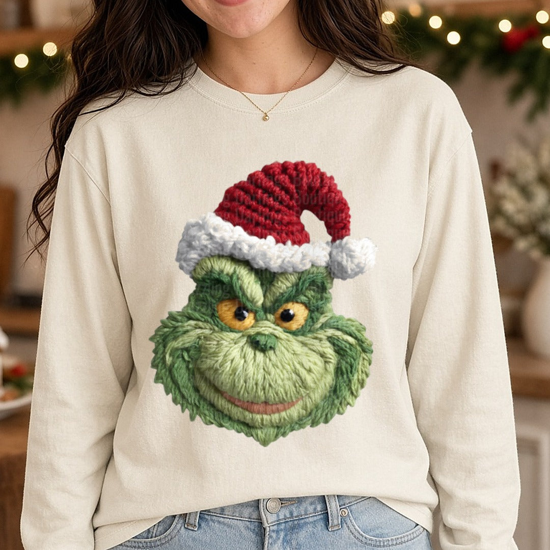 Grinch Chunky Knit Santa Hat Smiling Face DTF transfer shown on a Comfort Colors long sleeve tee