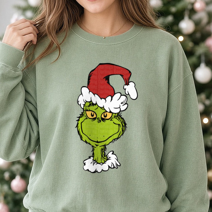 grinch classic happy DTF transfer shown on a Comfort Colors sweatshirt