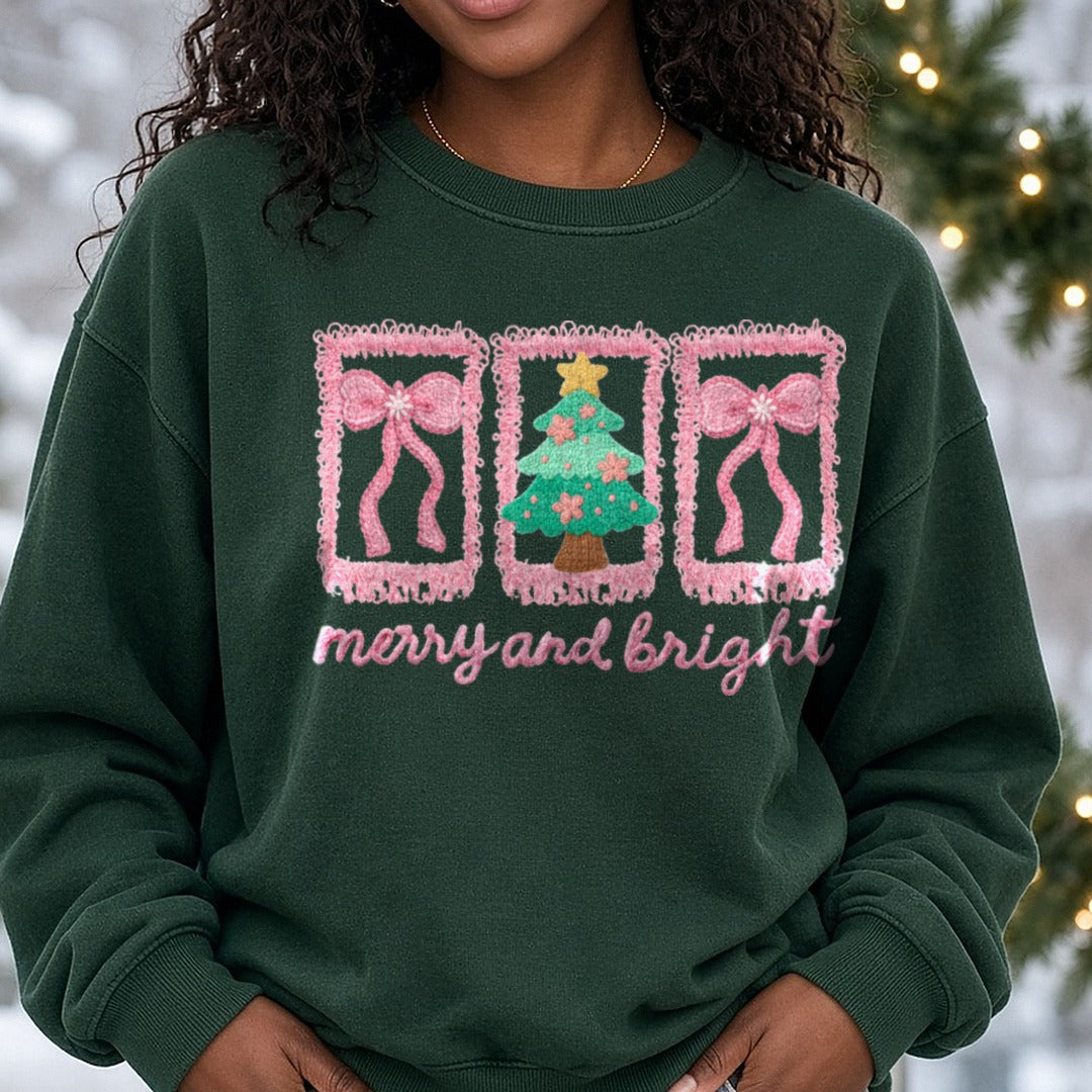 Merry And Bright Pink Bows Christmas Tree Frames DTF transfer shown on a Comfort Colors sweatshirt