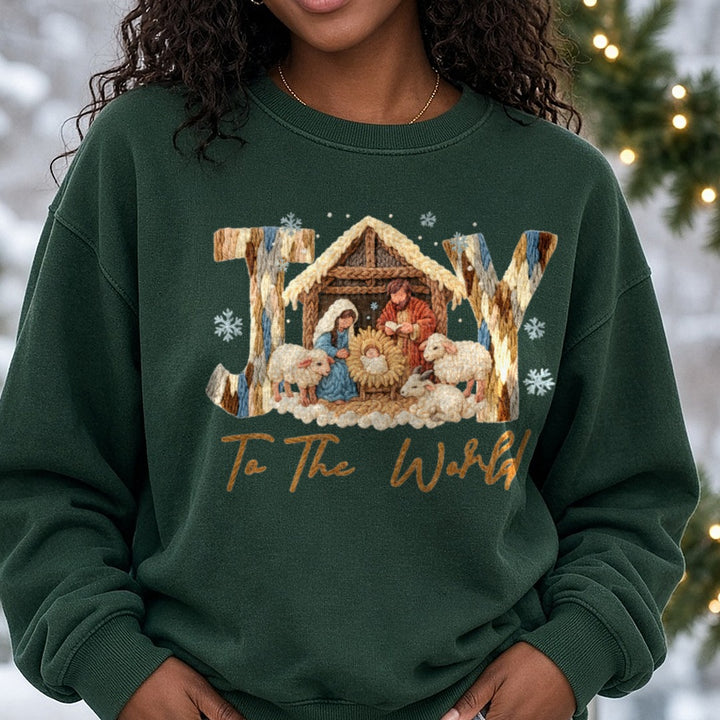 Joy To The World Rustic Nativity Letters DTF transfer shown on a Comfort Colors sweatshirt