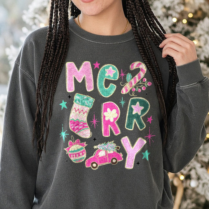 Merry Christmas Collage DTF transfer shown on a Comfort Colors sweatshirt