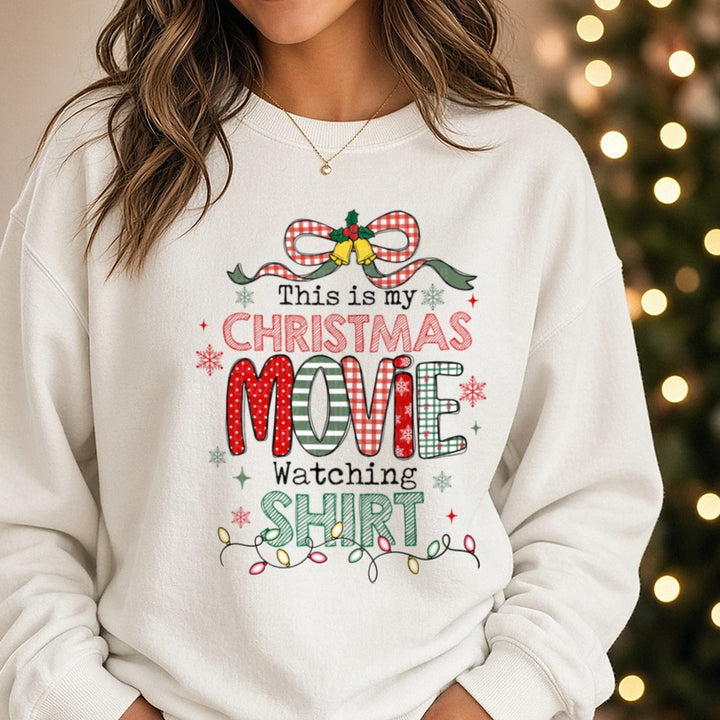 Christmas Movie Shirt DTF transfer shown on a Comfort Colors sweatshirt