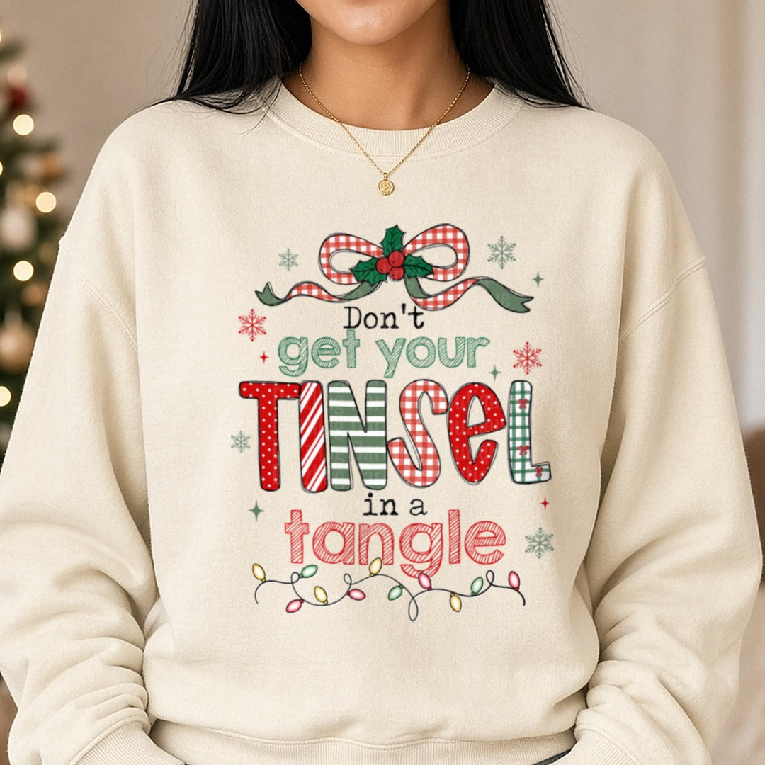 Don't Get Your Tinsel in a Tangle Christmas DTF transfer shown on a Comfort Colors sweatshirt