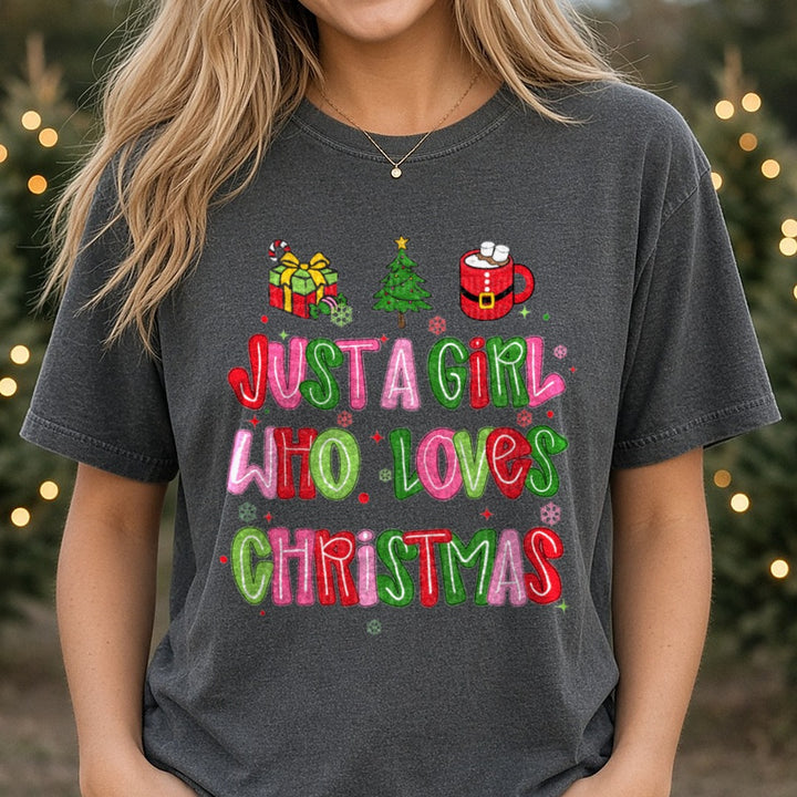 Just a Girl Who Loves Christmas DTF transfer shown on a Comfort Colors tee