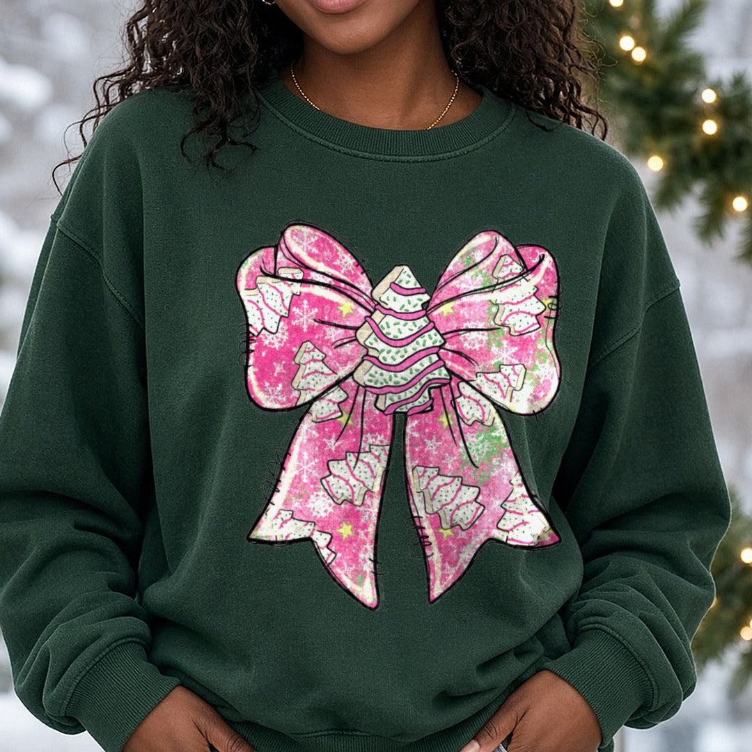 Christmas Tree Bow Pink Glitter Bow Tree Pattern DTF transfer shown on a Comfort Colors sweatshirt