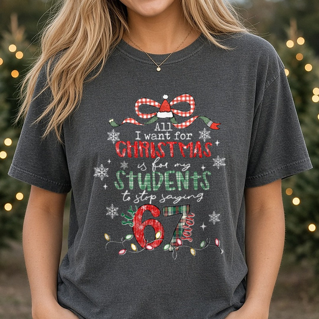 Christmas 67 Teacher Red Green Patterned Letters Santa Hat DTF transfer shown on a Comfort Colors tee