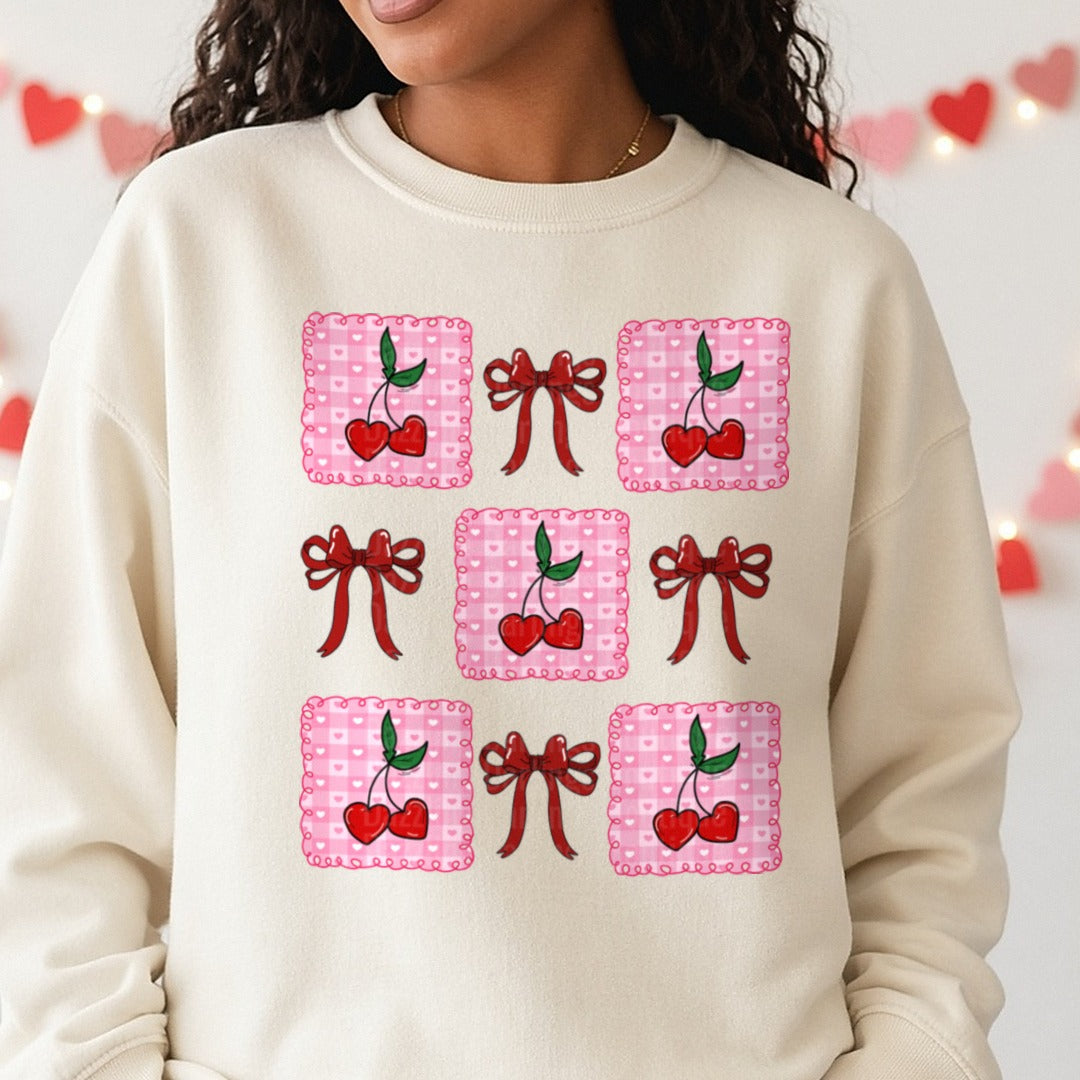 Cherry Coquette Valentine DTF transfer shown on a Comfort Colors sweatshirt
