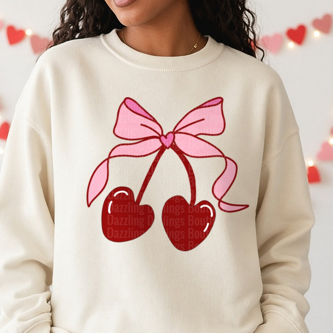 Valentine Coquette Cherry Pocket DTF transfer shown on a Comfort Colors sweatshirt