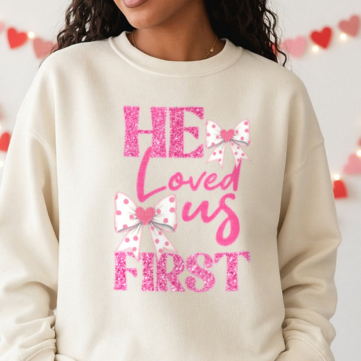 He Loved US First Valentines DTF transfer shown on a Comfort Colors sweatshirt