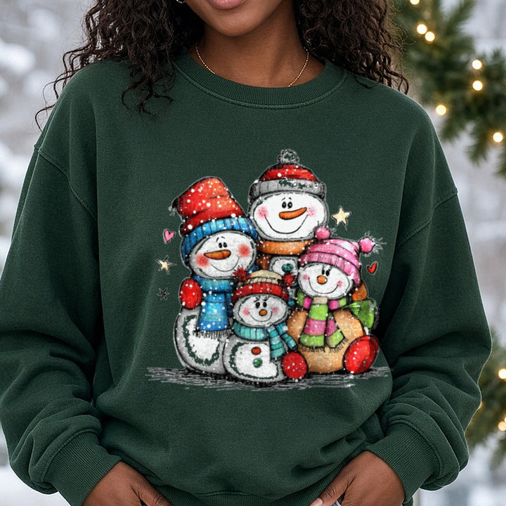 Hand-drawn Snowman Family DTF transfer shown on a Comfort Colors sweatshirt