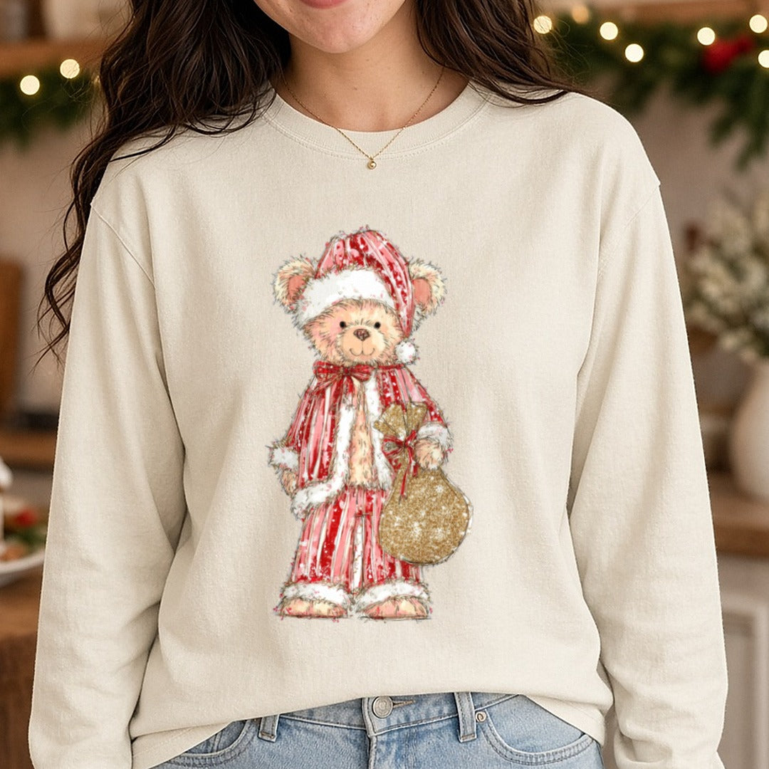 Christmas Teddy Bear Santa Hat Gold Ornament DTF transfer shown on a Comfort Colors long sleeve tee