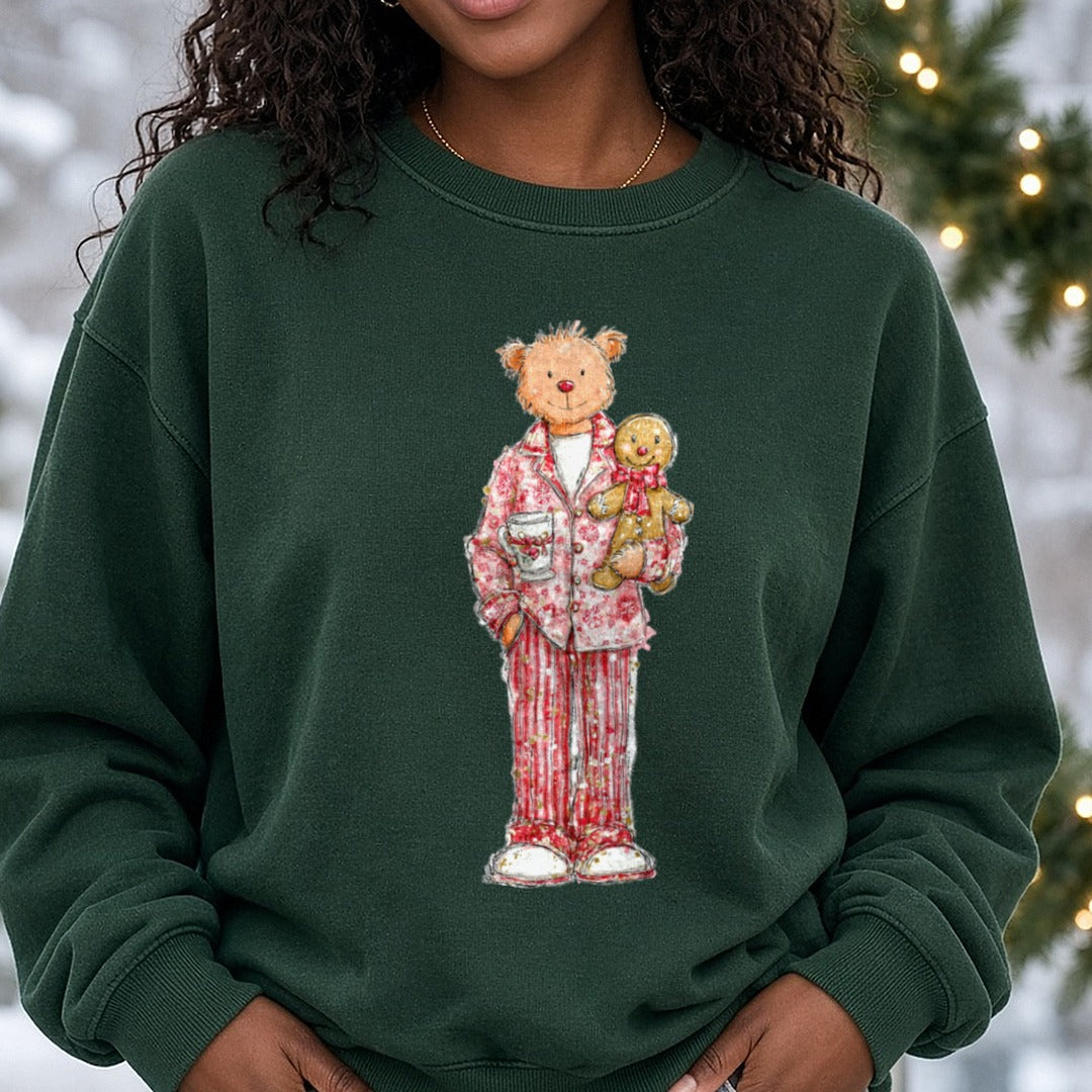 Christmas Teddy Bear Pink Pajamas Gingerbread Cocoa DTF transfer shown on a Comfort Colors sweatshirt
