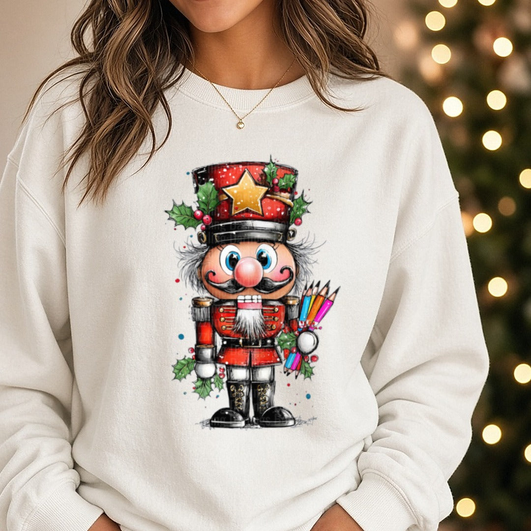 Hand-drawn Christmas Nutcracker DTF transfer shown on a Comfort Colors sweatshirt